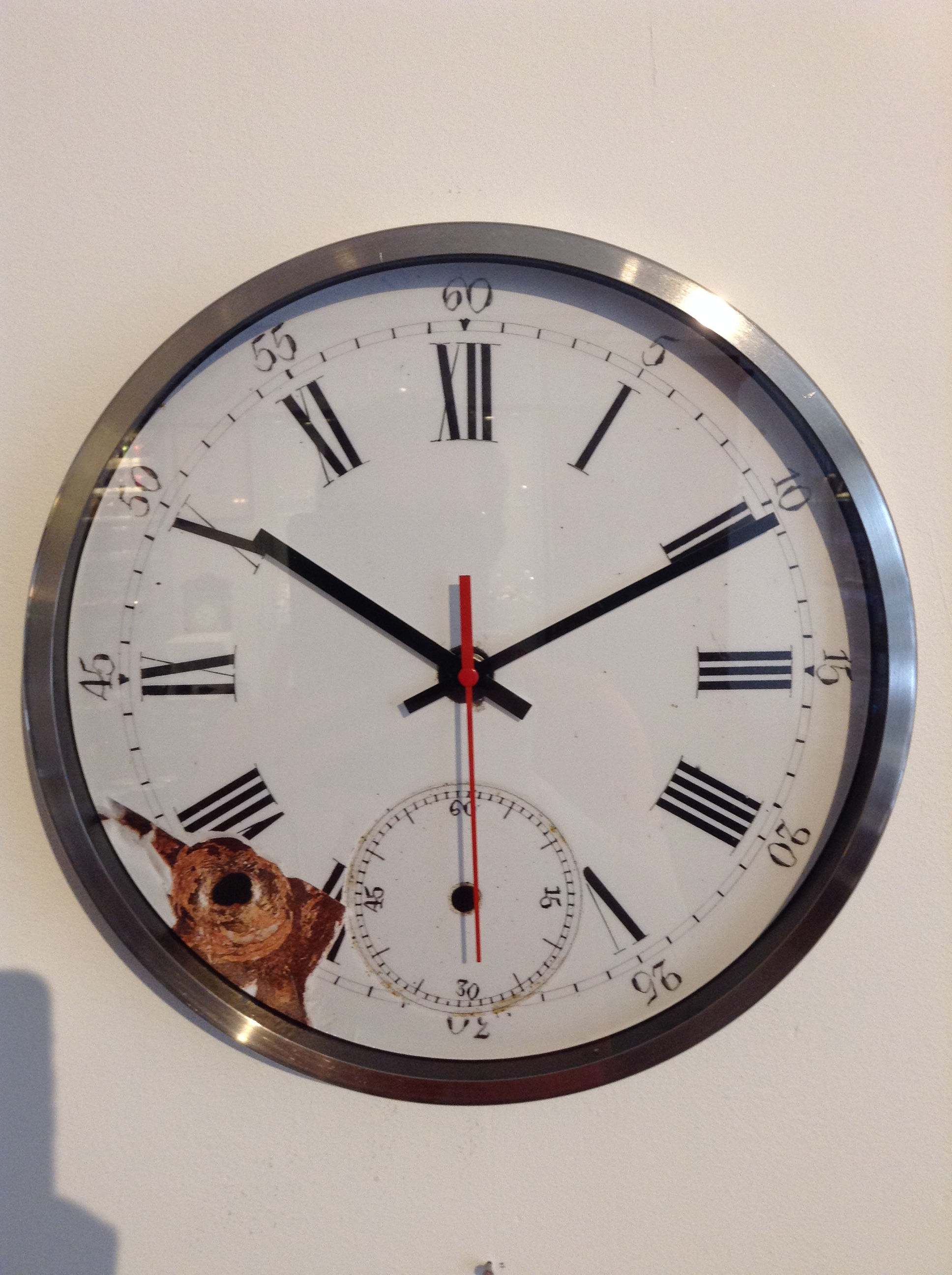 Broken faces wall clock