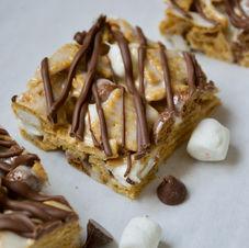 Gooey, chewy, s'mores bars made with Graham Slam cereal, marshmallows, and milk chocolate!