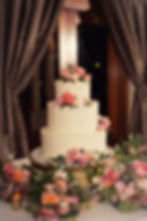 Perfectly pink flowers cover this beautiful and simple buttercream cake.