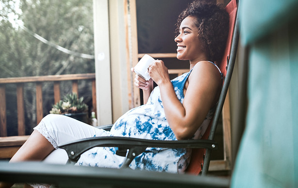 Pregnant Woman Enjoying her Drink