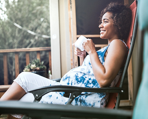 Pregnant Woman Enjoying her Drink