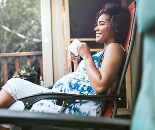 Pregnant Woman Enjoying her Drink
