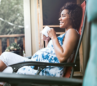 Pregnant Woman Enjoying her Drink