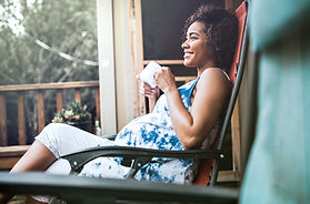 Pregnant Woman Enjoying her Drink