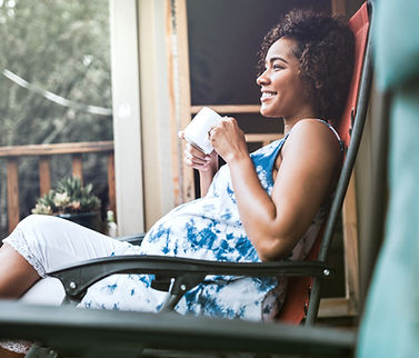Pregnant Woman Enjoying her Drink