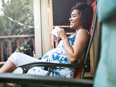 Pregnant Woman Enjoying her Drink