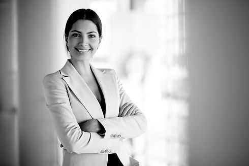 smiling-female-business-leader-with-arms