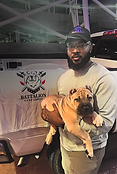Man holding puppy