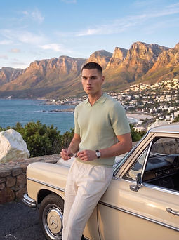 Man_leaning_on_vintage_car_202607092218.jpeg