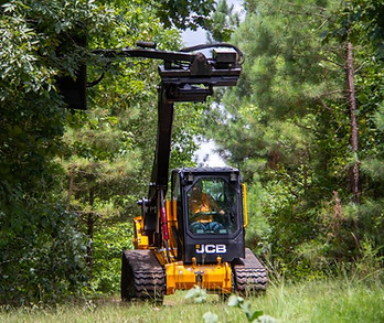 JCB 270T Track Loader with brush hog mower attachment clearing dense brush and trees - Rio Grande Valley TX