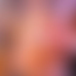 Tattooed man holding a packet of Dain's D'Rugz electrolyte hydration mix