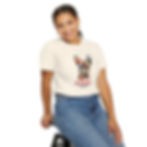 Young woman smiling and sitting while wearing a white unisex Frenchie printed t-shirt