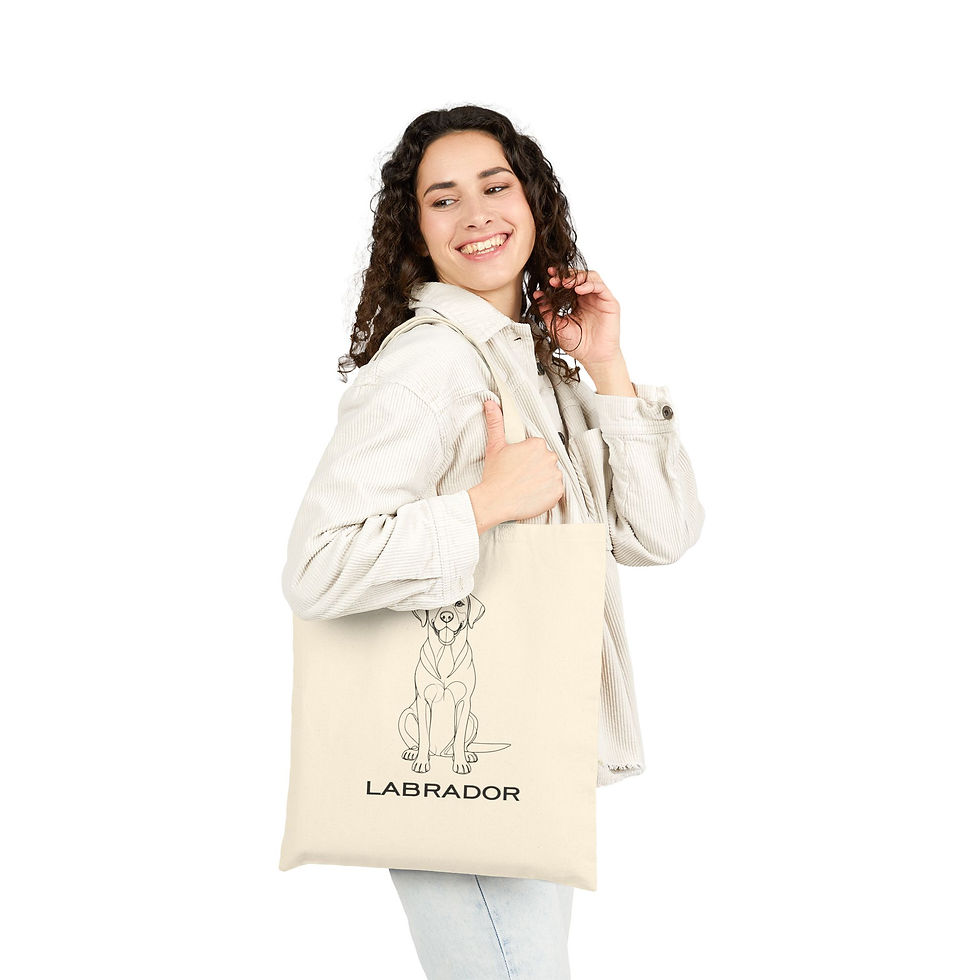 Thumbnail: Side view of a woman in a casual white shirt carrying a custom printed Labrador dog line art cotton tote bag