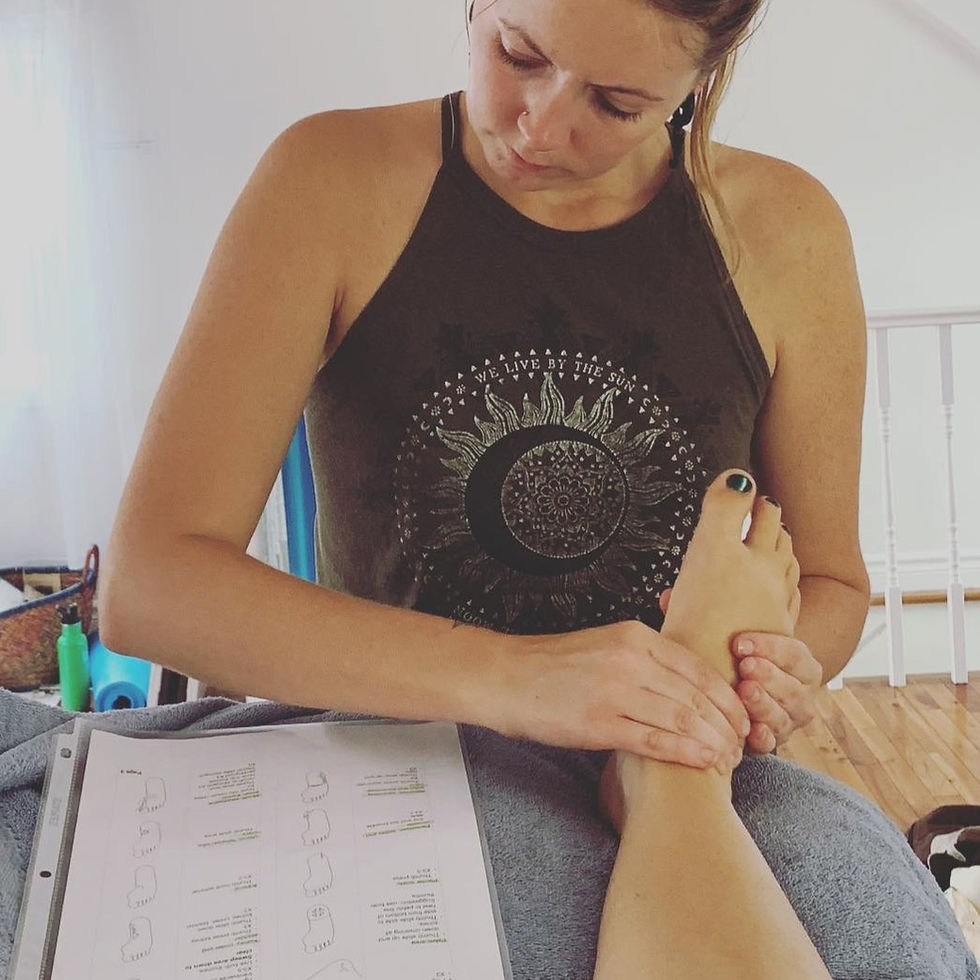 reflexology training student practicing