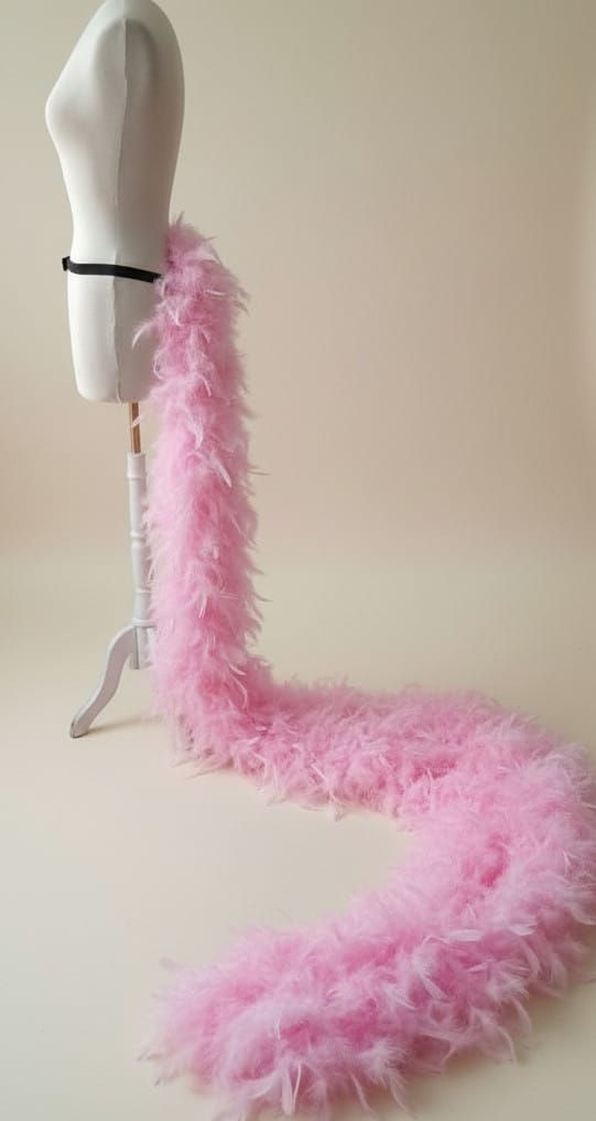 Extra long length for dramatic impact soft pink feather tie on bustle made and send from the uk