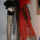 Thumbnail: Short Black feather short skirt with attached Black & Red Bustle sizes 6-14