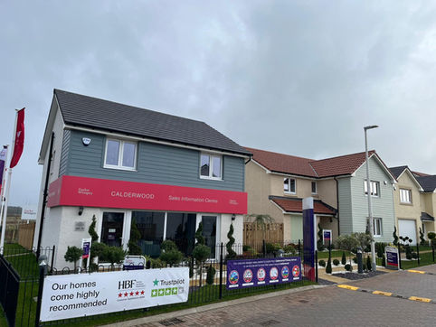 Taylor Wimpey Calderwood sales centre and new build homes with premium tiled roofing installed by McLean East
