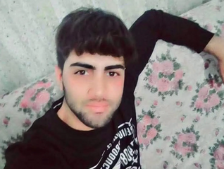 Toprağa gömülü halde bulunan kayıp genç Mehmet Emin Kara.