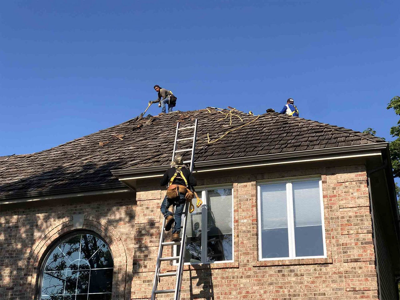 CMAC team working to repair roof