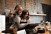 smiling-man-woman-cash-register.jpg