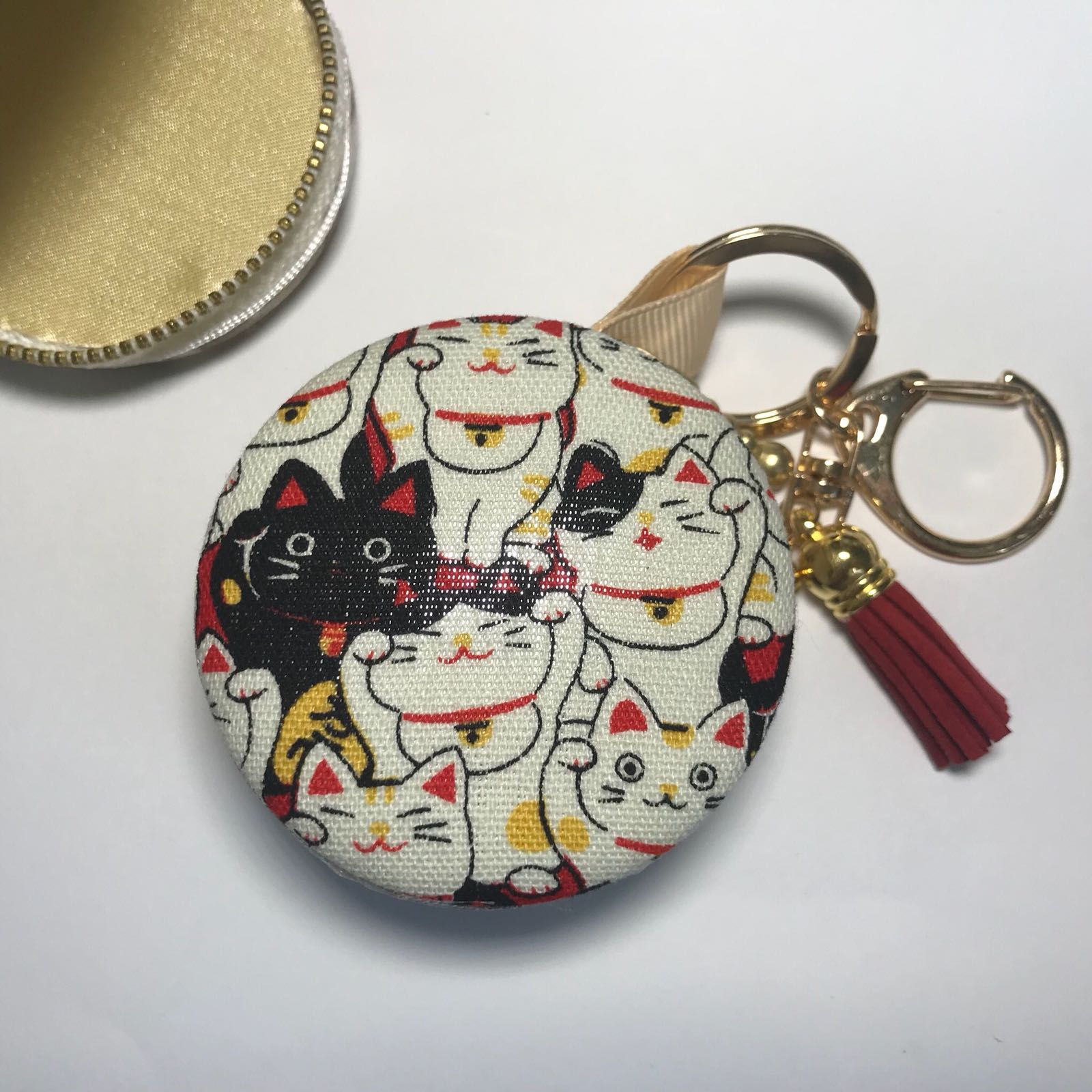 Delicately hand sew macaron concept pouch with keychain