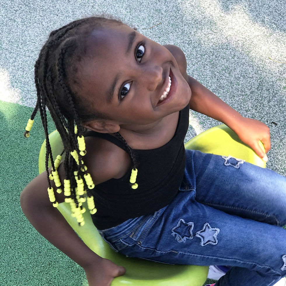yellow beads on 6 year old girl's braids