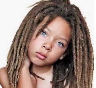 Blue eyed boy with locs