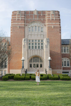 purdue graduate standing in front of the Union