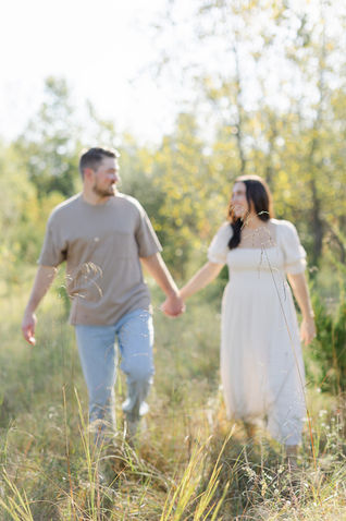 couple walking hand in hand  at murfreesboro park