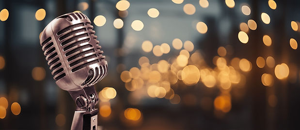 Metal classic microphone on lights background_edited.jpg