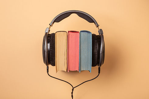 headphones on books, audiobooks concept.jpg