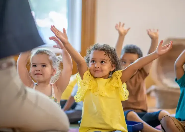 Preschool kids doing yoga.webp