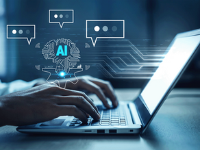 typing on laptop keyboard with AI and message icons