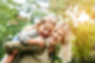 Cute young daughter on a piggy back ride