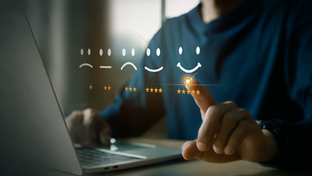 Rating scale and person at computer