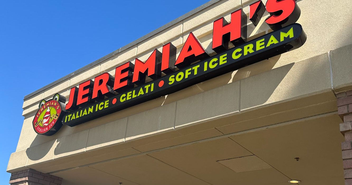 Custom exterior channel letter wall sign for a gelati shop installed on the side of a building overhang by Mello Signs.