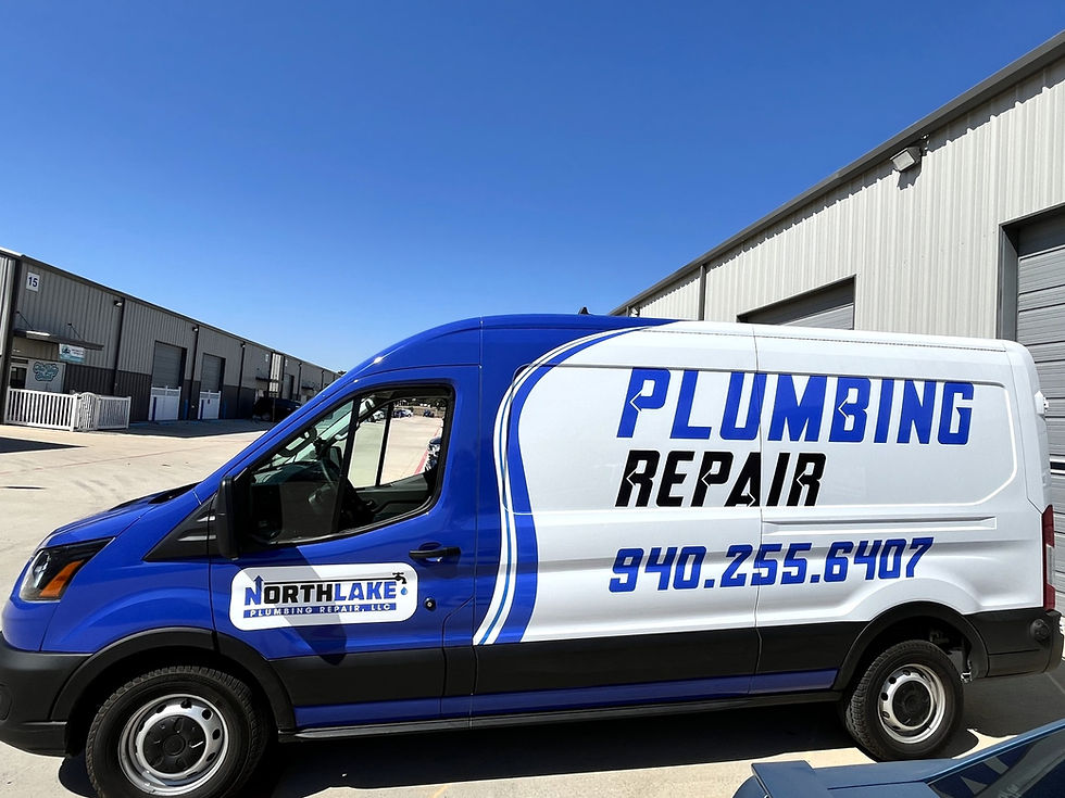 Company van with a full vinyl vehicle wrap in blue and white with blue and black lettering of the business name and contact.