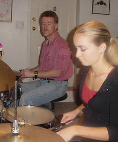 scott and student on the drums
