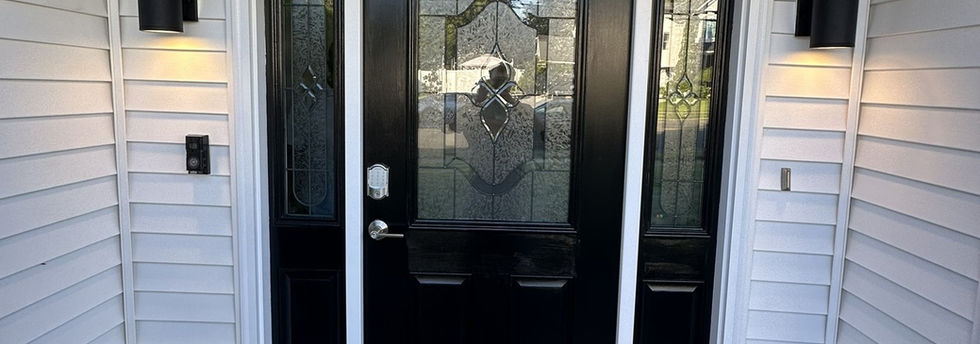 Black front door installation and painting in Bordentown NJ with white trim and exterior lighting

