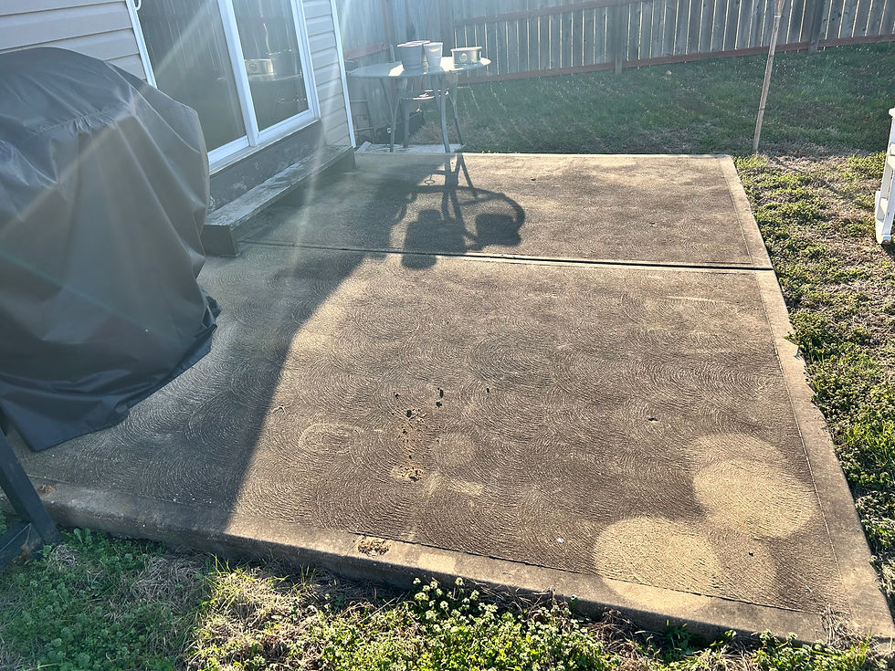 Dirty patio before concrete driveway stain removal.