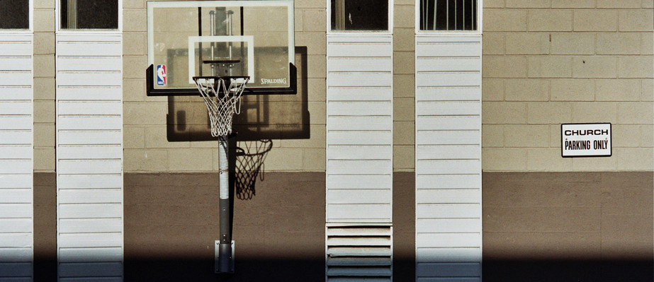 All Weather Basketball Net in suburban settings. often unused and decaying.