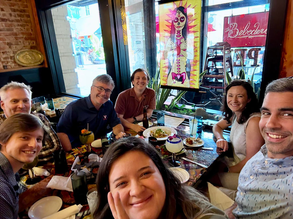 Livingston Law Group Team celebrating at Friday happy hour