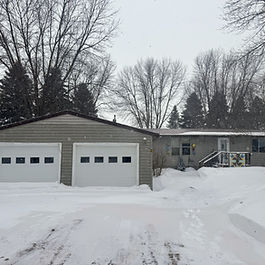  Easy one-level living on a leased lot #2, in Sunwest Acres 50+ community! This 3 bed, 2 bath home features a private master suite, spacious living room with gas fireplace, bright sunroom, and a peaceful treed lot- plus a 2 stall detached garage.
