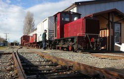 The TR shunter is hooked to a rake of wagons