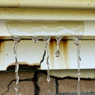 Gutter leaking with rust.