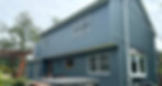 Home siding project completeted by CW construction with a blue color.