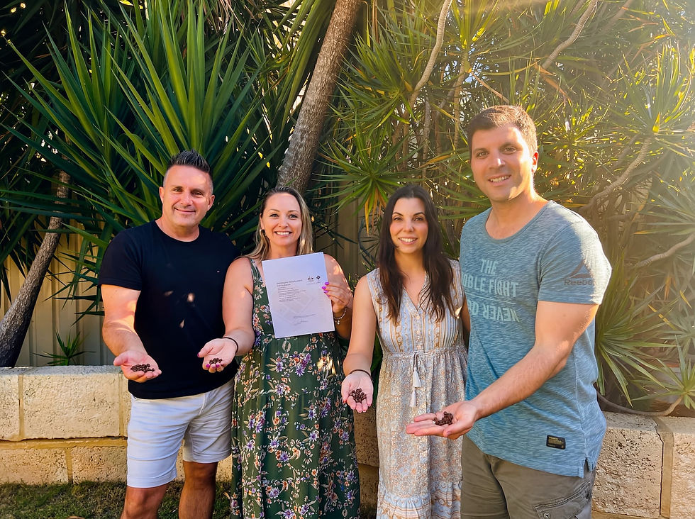 The We've Bean Coffee founding families holding locally roasted coffee beans Perth, celebrating the launch of their family owned coffee subscription Perth business