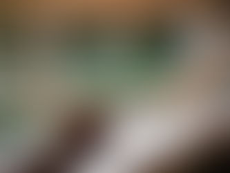 Business owner standing outside in the rain holding a sign about losing customers, symbolising poor website design and online presence