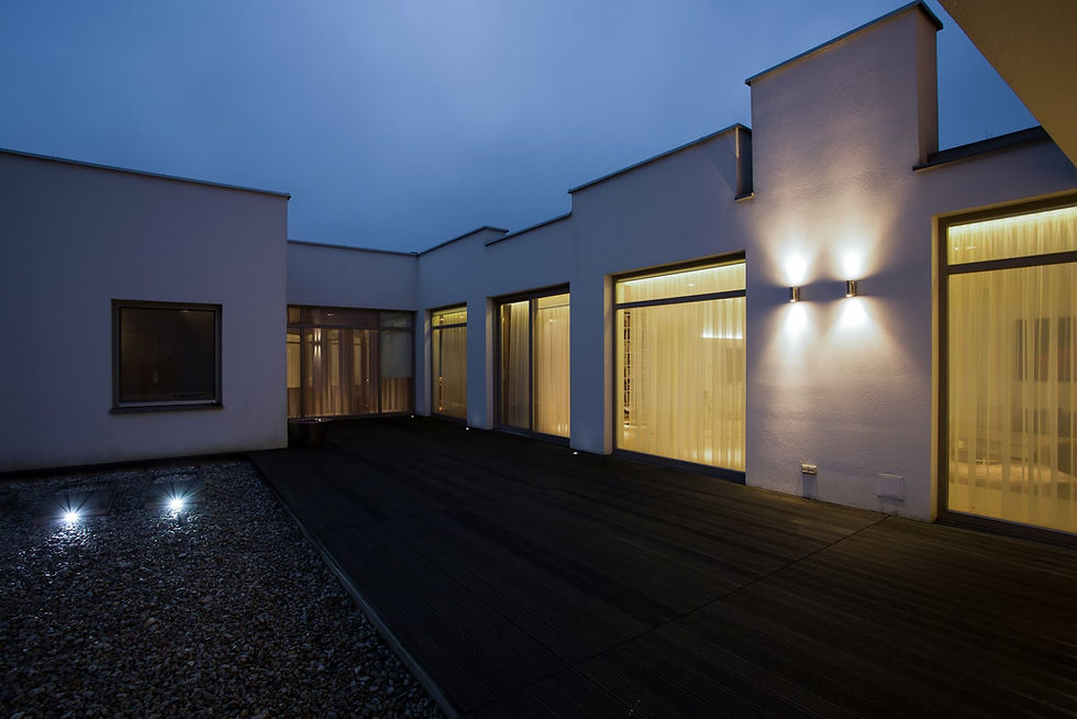 Wiser Electrical exterior lighting installation on a contemporary Perth home showcasing energy efficient wall lights at dusk.
