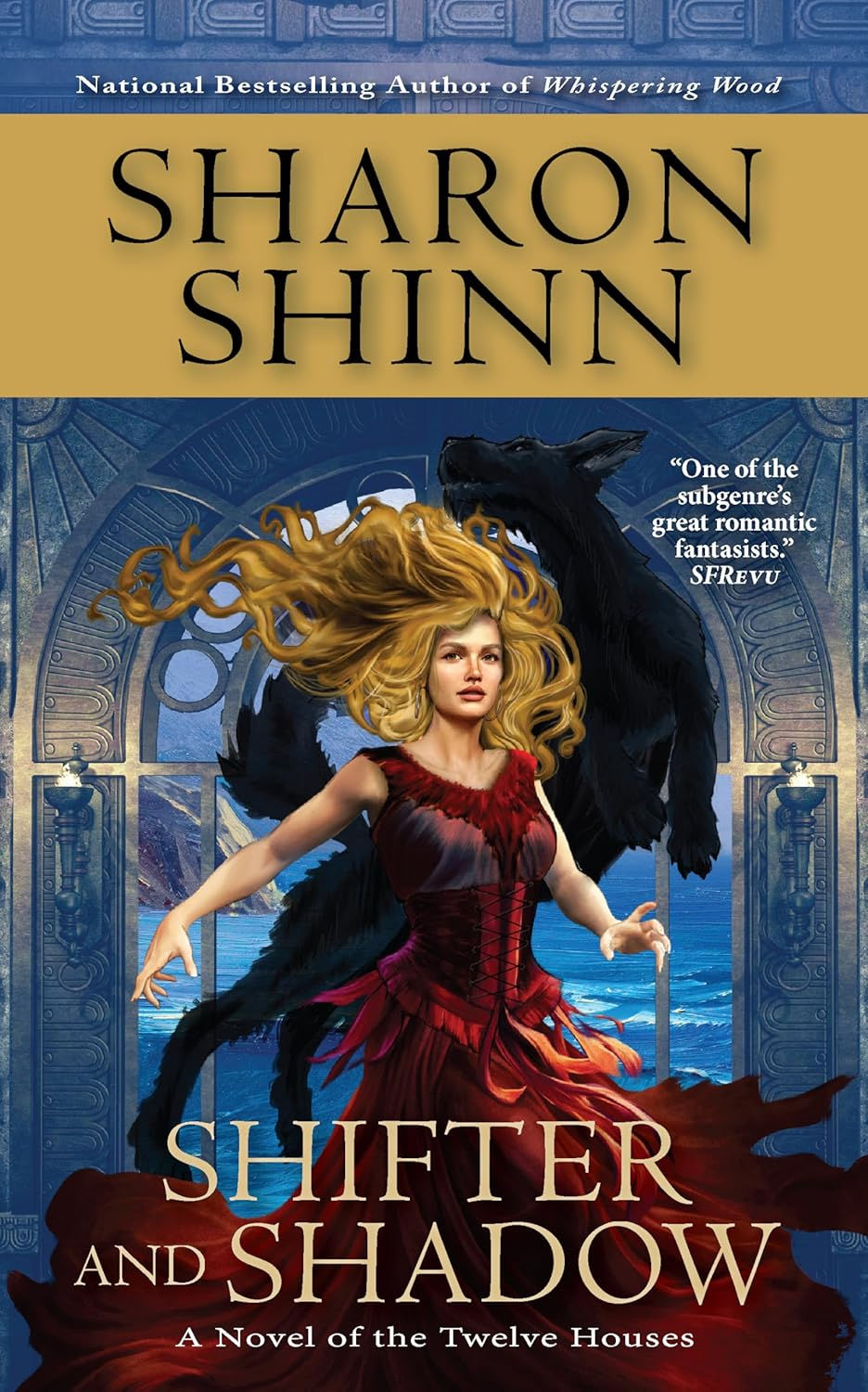 a woman with long blonde hair in a red gown in front of a large black door jumping with a window showing the ocean shore behind them.
